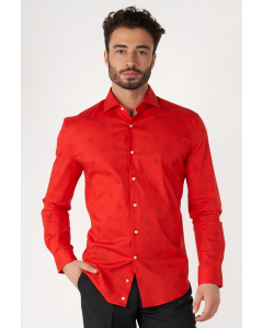 Man wearing red Christmas dress shirt with Christmas icons
