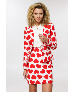 White women's suit with red hearts worn by woman