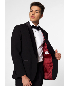 Solid black tuxedo suit Jet Set Black worn by man close up